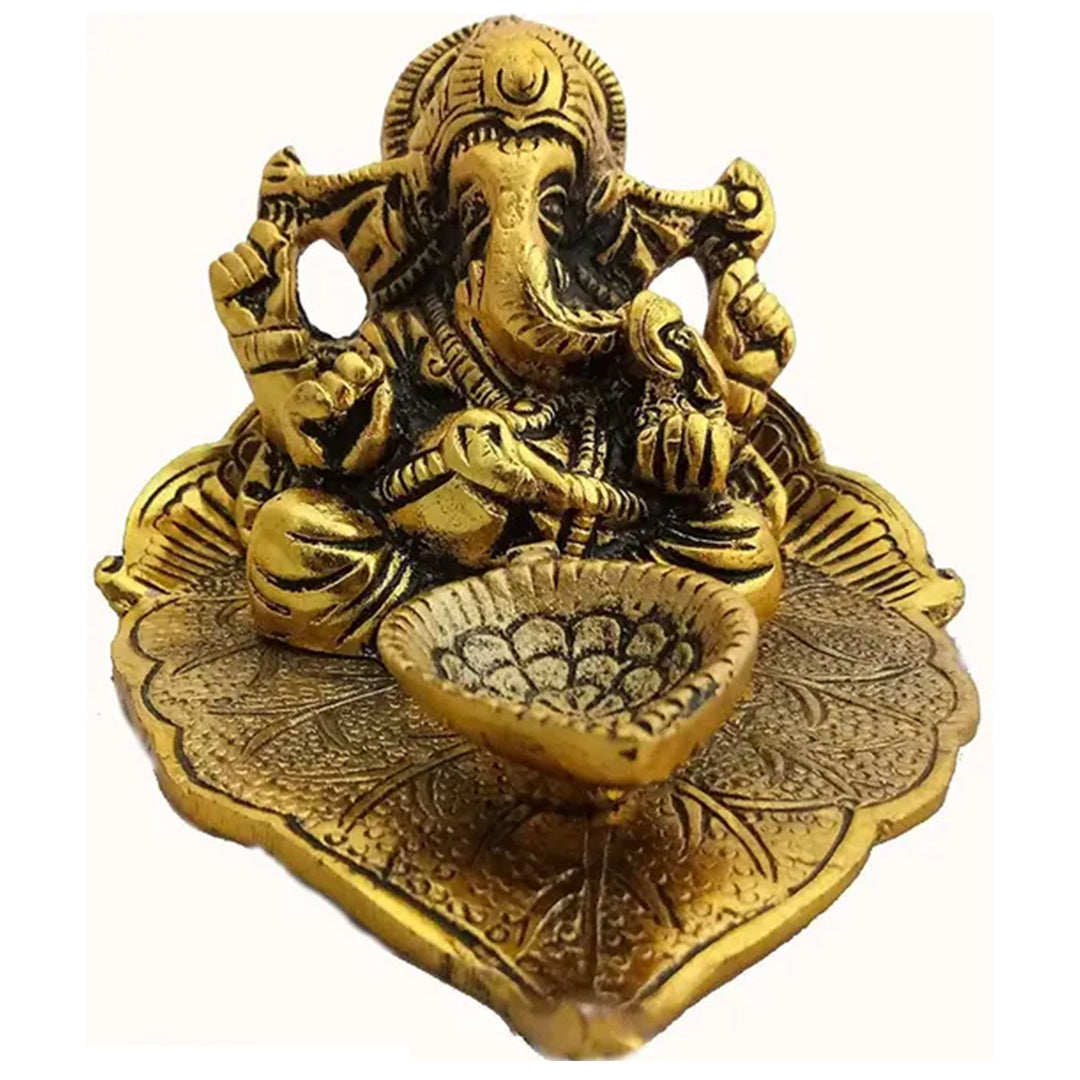 White Metal Golden Oxidized Ganesh Ji on Leaf with Diya - Diwali Decorative Gift Item